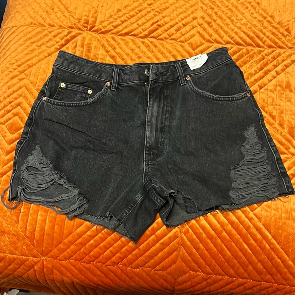 TOPSHOP black denim distressed shorts